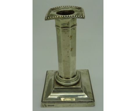 A silver candlestick, height 13cm