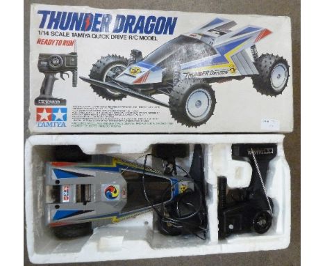 A Tamiya 1/14 scale remote control Thunder Dragon model vehicle, box a/f