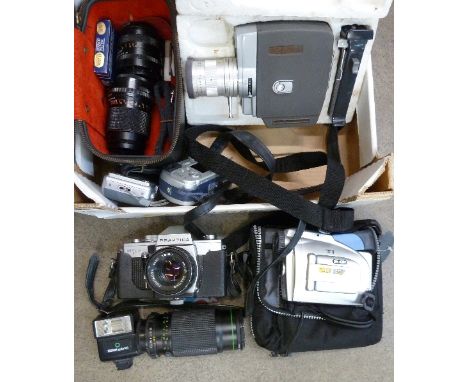 A Praktica MTL3 camera, four lenses, a Jelco wind-up cine camera, two other cameras and a digital video camera
