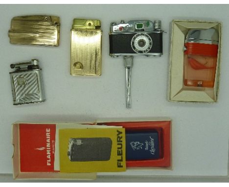 Assorted lighters including one in the form of a novelty camera and tripod (6)