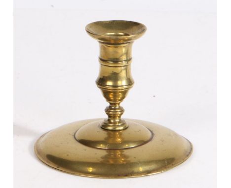 A George III brass lantern candlestick, circa 1760Having a gently waisted socket with mid-fillet and flared flange, short ste
