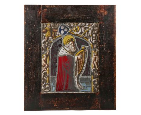 Stained glass panel, 18th Century or earlier, with central depiction of St. David playing his harp, the outer panels depictin