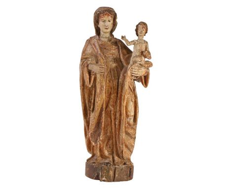 A 16th/17th century polychrome-decorated figural carving, Madonna & Child, EuropeanThe Virgin wearing flowing robes, the Chri