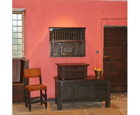 A rare Elizabeth I joined oak and spindle-turned mural livery cupboard, West Country, probably Devon, circa 1580Having a cave