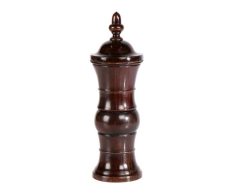 A George III lignum vitae coffee grinder, circa 1770


The finial top above a dome and shaped tower&nbsp;body enclosing a gri