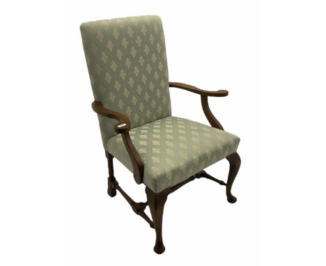 Georgian style stained beech frame open armchair, on cabriole supports joined by turned stretchers, upholstered in light blue