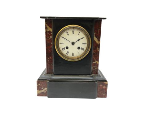 A Victorian Belgium slate mantle clock with a flat-topped breakfront case, with white veined rouge marble corners to the fron