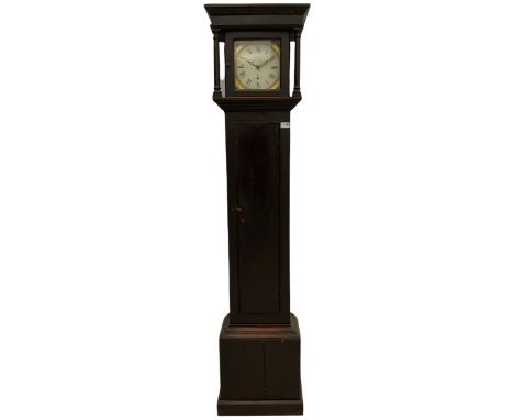 A provincial 30-hour chain driven longcase clock in an oak finished case with a flat top and wide cornice pediment, full leng