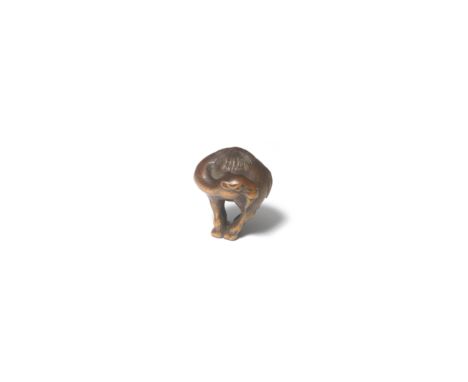 A WOOD NETSUKE OF A DROMEDARYBy Masakatsu, Yamada, Ise Province, Edo period (1615-1868), 19th centuryStanding upright with it