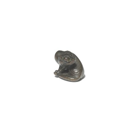 A WOOD NETSUKE OF A TIGERBy Naito Toyomasa (1773-1856), Tanba Province, Edo period (1615-1868), early/mid-19th centuryThe sab