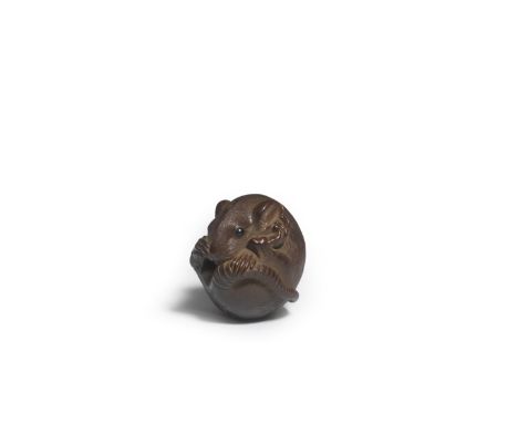 A WOOD NETSUKE OF A LARGE COILED RATBy Masanao, Yamada, Ise Province, Edo period (1615-1868), early/mid-19th centuryThe rat c
