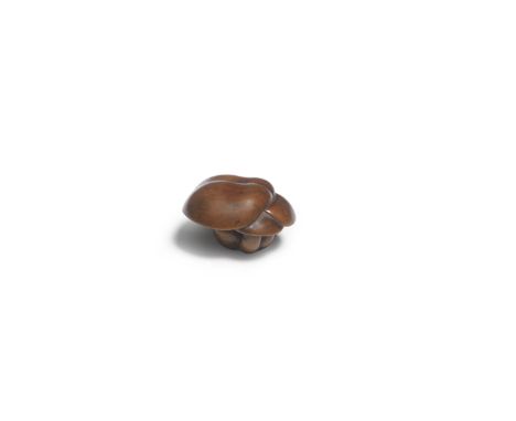A WOOD NETSUKE OF A MUSHROOM CLUSTEREdo period (1615-1868) or Meiji era (1868-1912), 19th centuryThe cluster with three mushr