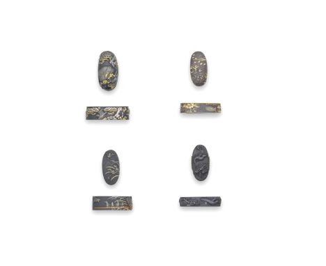 FOUR FUCHI-GASHIRA (MATCHING HILT COLLARS AND POMMELS)Edo period (1615-1868), 18th to 19th centuryThe first two shakudo nanak