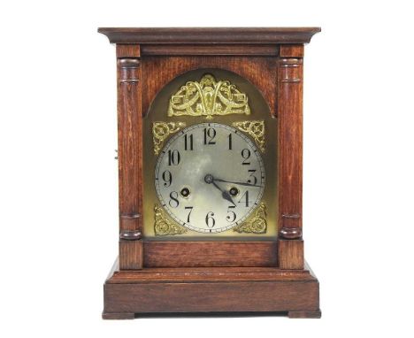 An early 20th century oak cased bracket clock, with a twin train movement, 32cm high