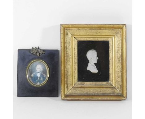 English School, 19th century, a miniature head in profile, wax, 12 x 9cm, together with a miniature portrait of Nelson, on iv