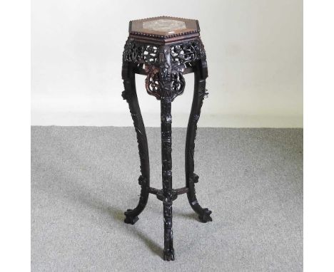 A 19th century Chinese carved hardwood jardiniere stand, 91cm highOverall condition is complete and usable. Some light scratc
