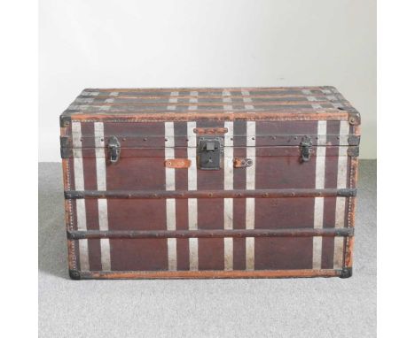A 19th century wooden bound canvas travelling trunk, bearing a label for Ernst Hofmann, Karlsbad100w x 54d x 60h cm