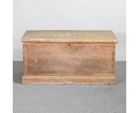 An antique pine trunk, with a hinged lid106w x 48d x 52h cm