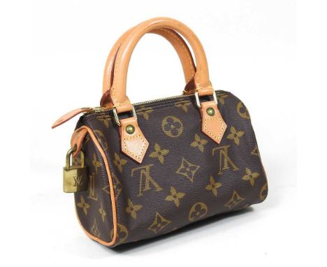 A Louis Vuitton Nano Speedy handbag, in monogram canvas, with dust bag, 16cm wide, with authenticationStuds are tarnished and