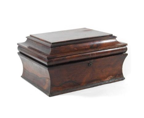 A large late Regency rosewood tea caddy, of rectangular shape, with a cavetto moulded hinged lid, containing four lidded cani