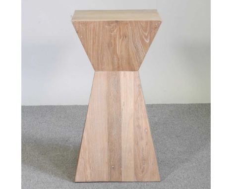 A modern light elm pedestal, of waisted shape40w x 40d x 75h cm