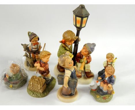 Hummel and Berta Hummel figures, including Little Goat Herder, Making Spirits Bright, Cat Tales, Snack Time and With Love, (1