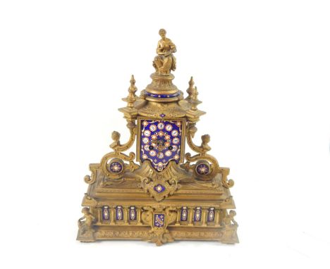 A Japy Freres et Cie gilt metal and enamel mantel clock, of Gothic architectural form with figural surmount, dial bearing Rom