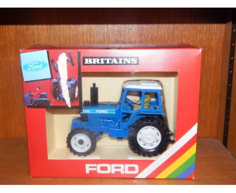 A Britain's Ford 7710 Tractor, model no. 9523, in original box.