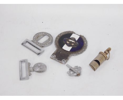 A group of Northern Rhodesian Police memorabilia, relating to Inspector Douglas Fisher, comprising belt buckle, chrome and en
