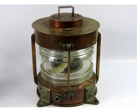 A copper and brass ship's lantern, 35.5cm high.
