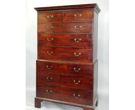 A George III mahogany chest on chest, with two short and six long graduated drawers, raised on bracket feet, 110.5cm x 58.5cm