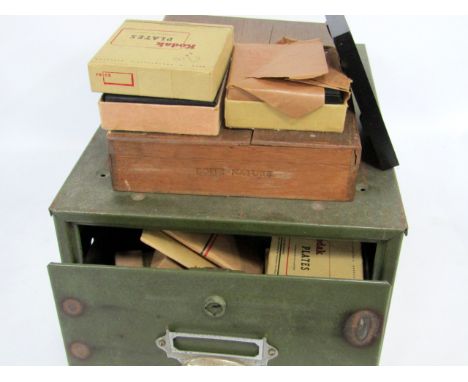 A collection of magic lantern slides, photographic plates and mahogany photographic plate slides.