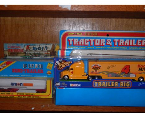 Champs of the Road die cast tractor and trailers and semi-trailers, many advertising K-Mart, boxed (9).