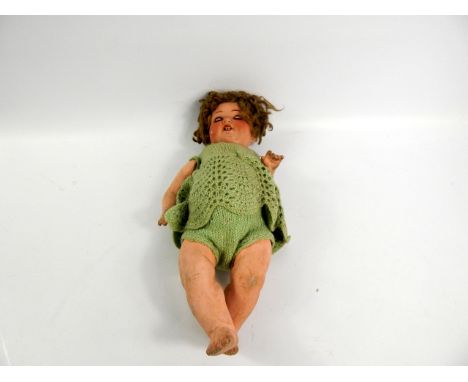 An early 20thC Armand Marseille bisque headed baby doll, with articulated limbs, impressed marks Armand Marseille Germany 996