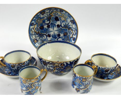 A Wedgwood porcelain part tea and coffee service, decorated in blue and gilt with flowers, early 19thC, comprising saucer dis