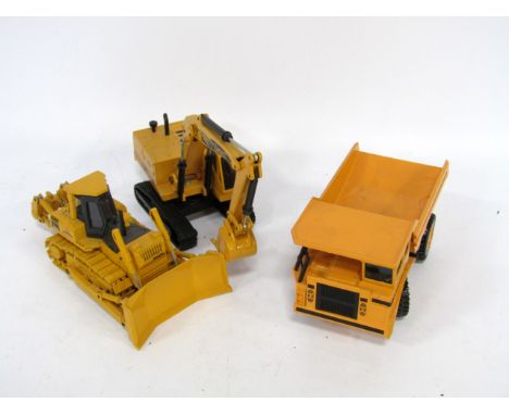 Die cast construction vehicles, including Joal Excavators, bulldozers, dump trucks, Solido Ac Cobra 427, Corgi Jaguar XK120 s