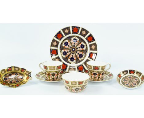 A group of Royal Crown Derby porcelain, decorated in the Old Imari pattern, No 1128, printed marks, comprising a pair of coff