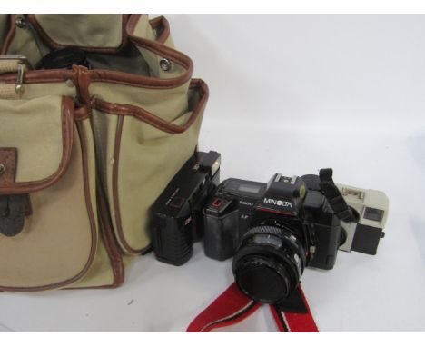 A Minolta 5000 35mm SLR camera, with 35-70 lens and 100-300 AF lens, Clack camera, Halma camera, camera bag, etc.