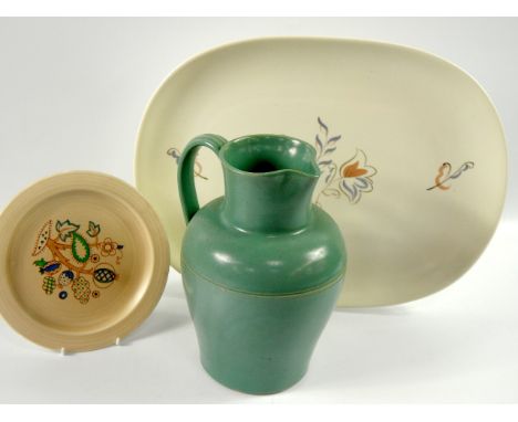 A Poole Pottery meat platter, painted with stylised flowers, circa 1950s, 41.5cm long, Clarice Cliff plate and a Buchan potte