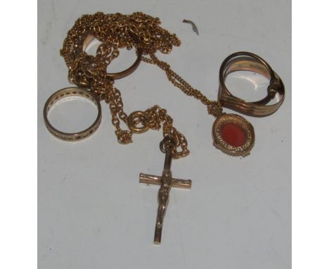 A 9ct gold cameo pendant, a 9ct gold tricolour ring, other dress rings and a 9ct gold crucifix, etc.