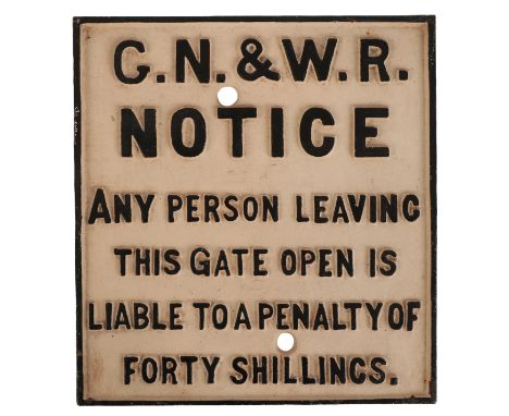 TWO CAST IRON RAILWAY SIGNS including a G. N. & W. R. notice to close the gate, 28cm x 26cm, and a Somerset and Dorset Railwa