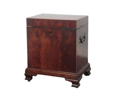 A GEORGE III MAHOGANY AND SATINWOOD STRUNG CELLARETTE the hinged top opening to a fitted interior, brass swing handles to eac