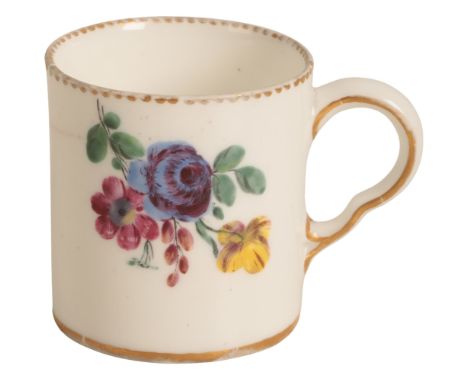 A SÈVRES PORCELAIN COFFEE CAN circa 1766, with gilt scalloped lip and decorated with flower sprigs, blue mark to the rear, 6c