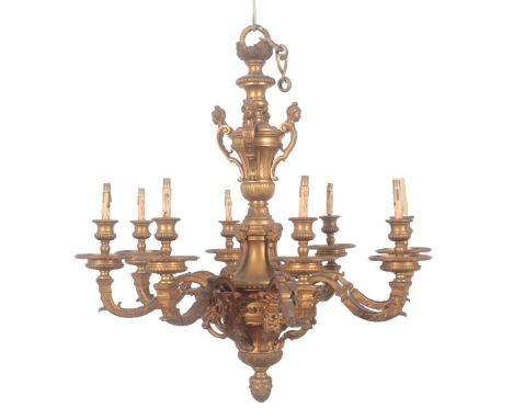 AN EIGHT-BRANCH 'MAZARIN' GILDED BRONZE CHANDELIERearly 20th century, the ornate double urn central column with four classica