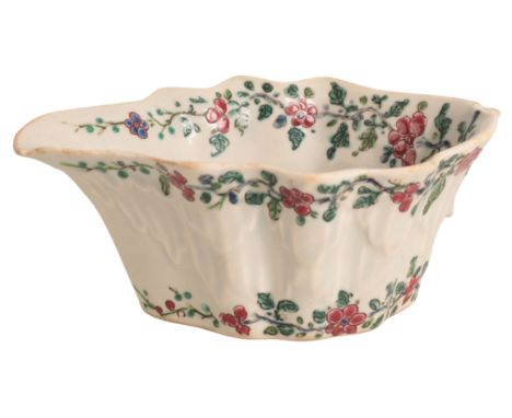 A BOW PORCELAIN SAUCEBOAT circa 1750, of leaf outline, decorated with garlands of flowers and leafy tendrils, 11cm wideProven