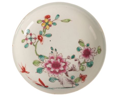 A BOW PORCELAIN SAUCER circa 1760, decorated with flowers aside a rocky outcrop, 12cm diameterProvenance: Acquired from Stock