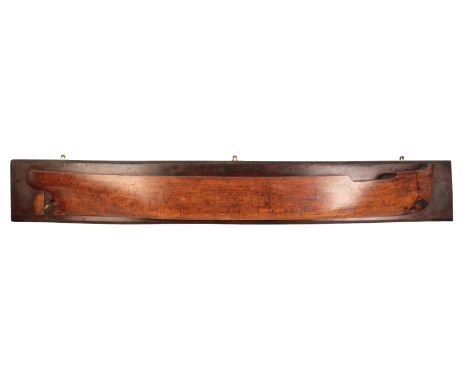 A HALF-HULL SHIPWRIGHT'S WOODEN MODEL OF A SHIP mid to late 20th century, marked with intricate draftsman's details, mounted 