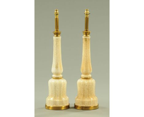 A pair of internally painted glass and brass table lamps.  Height to top of light fitting 72 cm. 