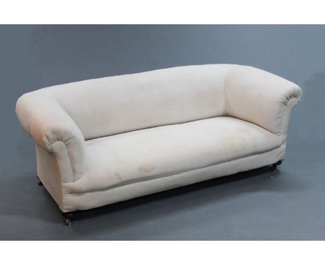 A Victorian Howard &amp; Son style Chesterfield settee, upholstered in neutral calico, the rear legs stamped "7062" and "3838