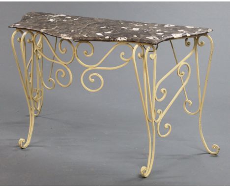 A wrought iron and marble topped serpentine console table.  Width 145 cm, depth 56 cm, height 84 cm. 